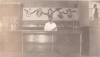 Pvt. George Lambert. Officers' Club bar. Camp Cooke. Feb. 1943