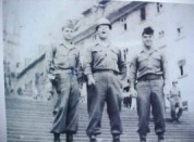 Three soldiers coming from church services