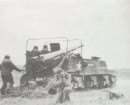 155 mm.